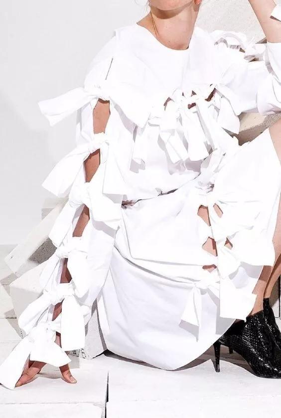 女裝流行元素分析 蝴蝶結(jié)元素在服裝設(shè)計中的運用(圖13)